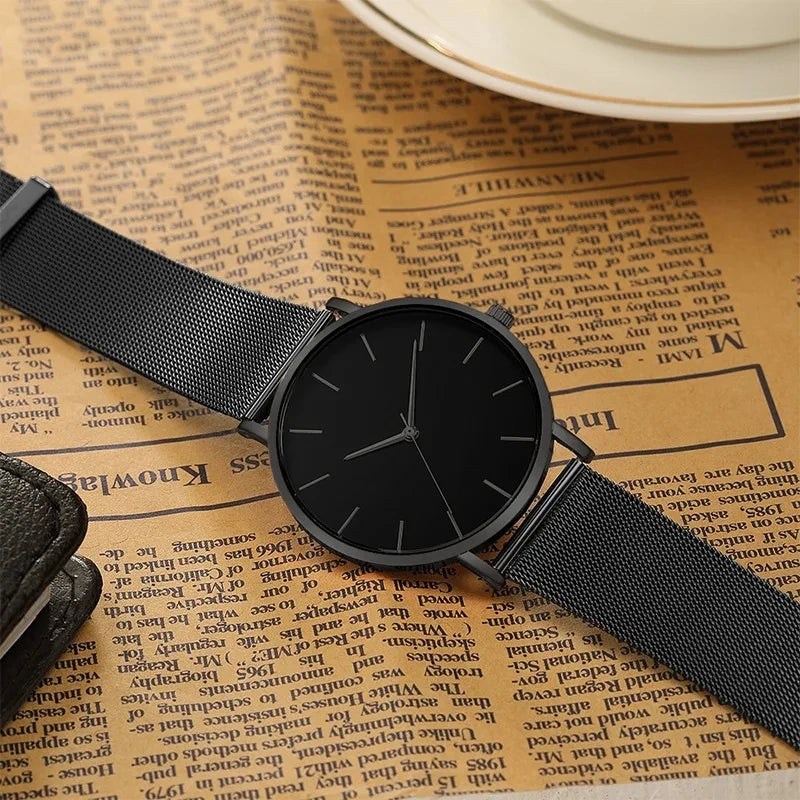 Watche Ultra-Thin Black Steel Quartz Watch – Sleek. Silent. Powerful Stones Men